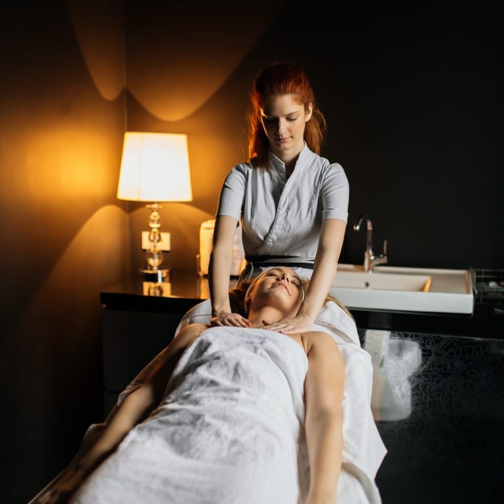 massage-therapist-massaging-woman-2023-11-27-05-30-16-utc